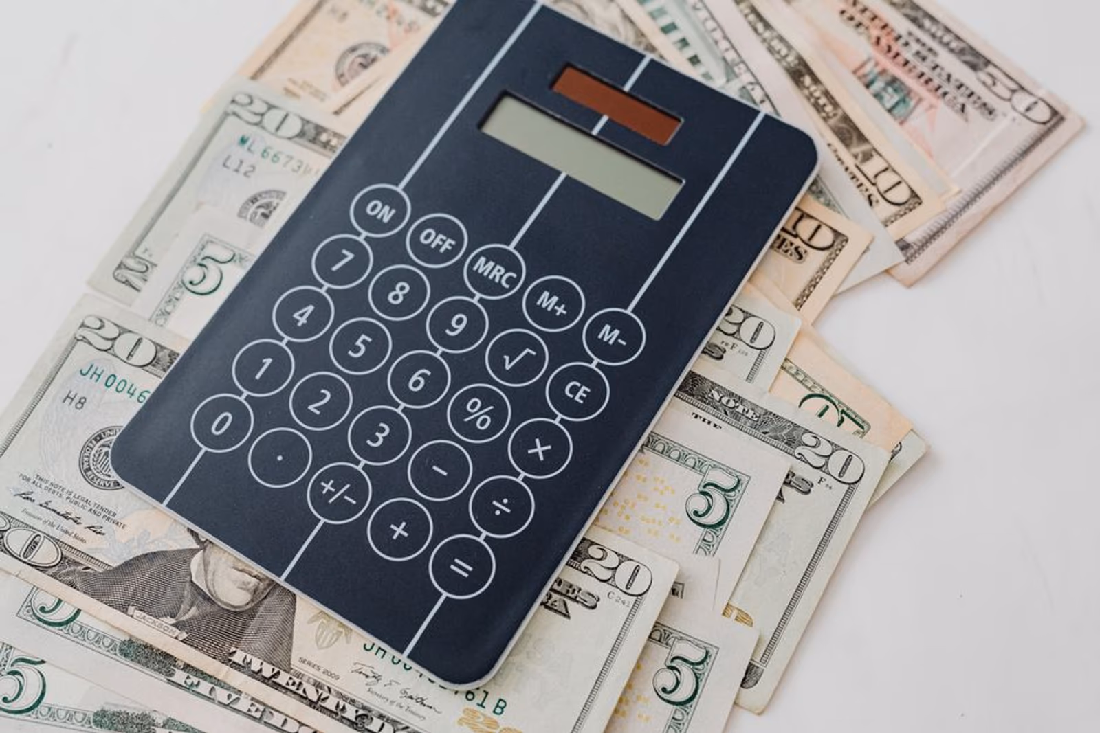 A finance dashboard showing cost breakdown charts and calculator tools for AI agent infrastructure modeling