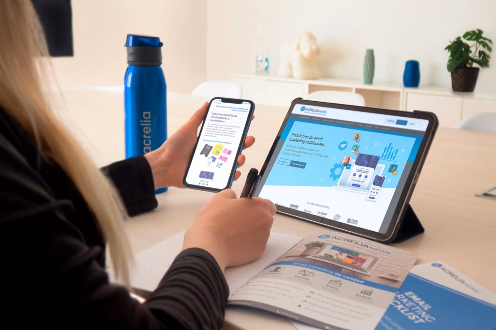 App marketing analyst reviewing dashboards across multiple analytics platforms on a clean desktop setup.