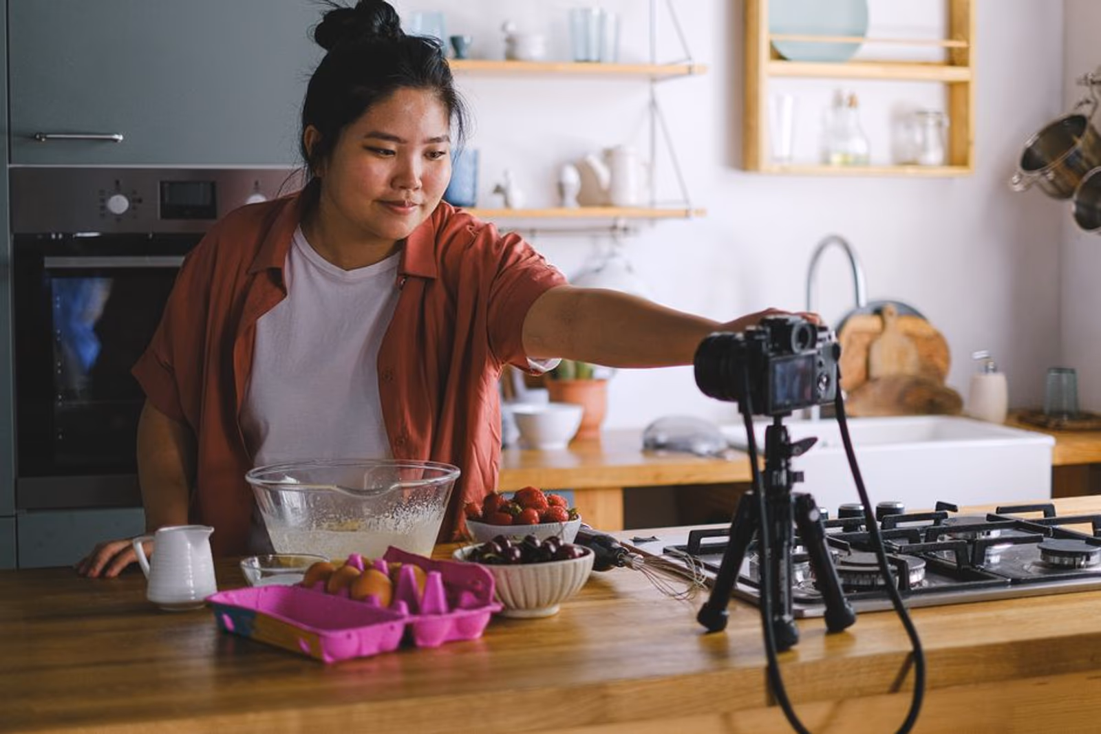 Content creator filming a UGC video for a mobile app advertisement