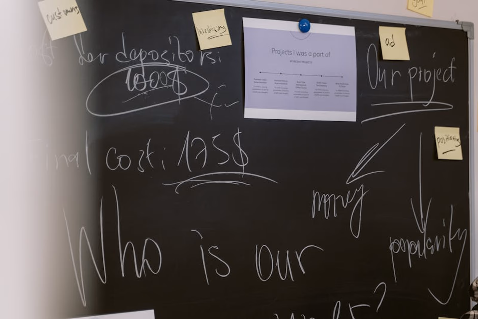 A whiteboard diagram mapping the inputs, outputs, and decision nodes of an AI agent workflow