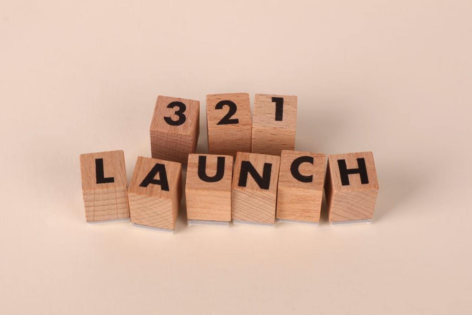 A launch countdown calendar pinned to a wall showing 90 days of mobile app marketing milestones