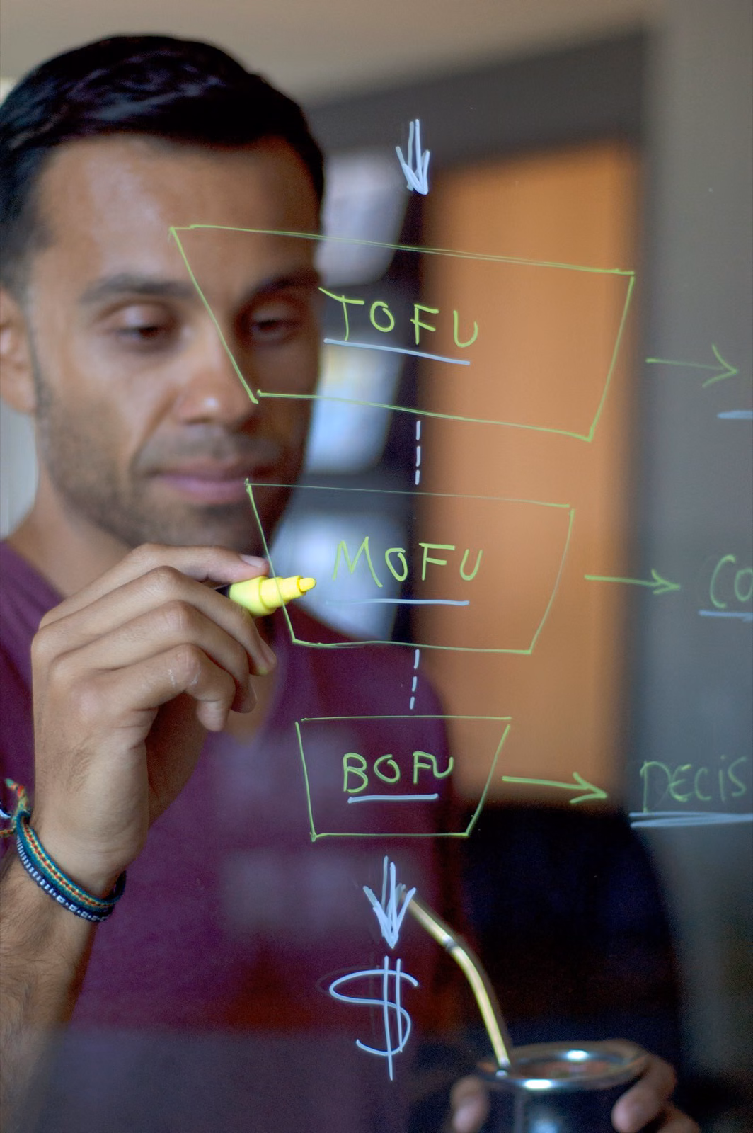 Recruiter reviewing automated candidate pipeline and stage updates on a shared screen with hiring manager.