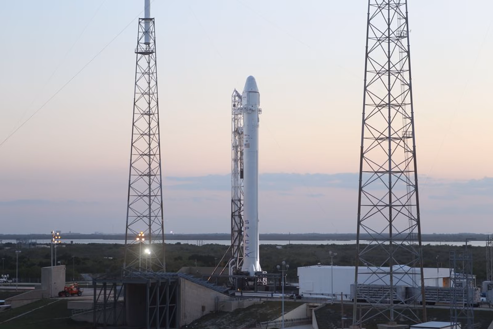Rocket on a launch pad being prepared for liftoff, representing a controlled mobile app soft launch before full-scale rollout